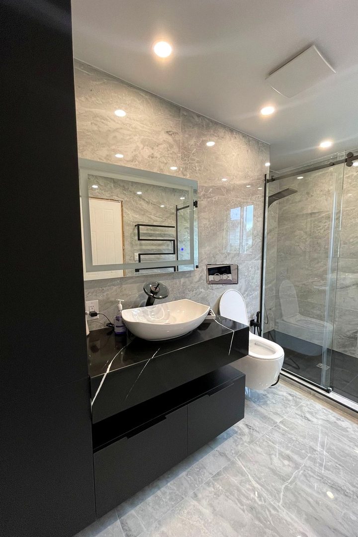LED backlit vanity mirror in a bathroom